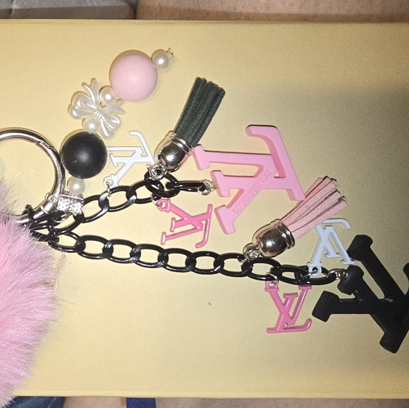 Louis Vuitton Pink and Black Fluffy Keychain - Picture 1 of 11